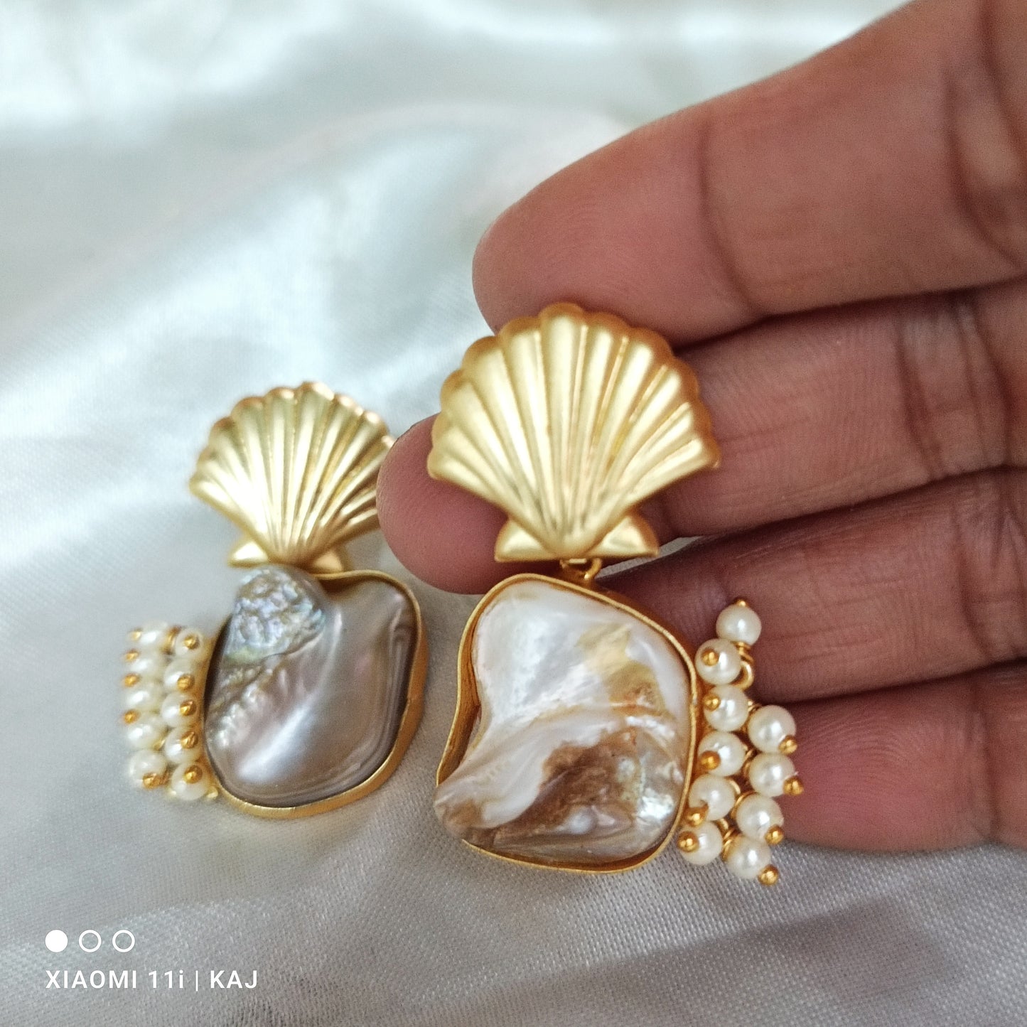 Mother of Pearl's earrings