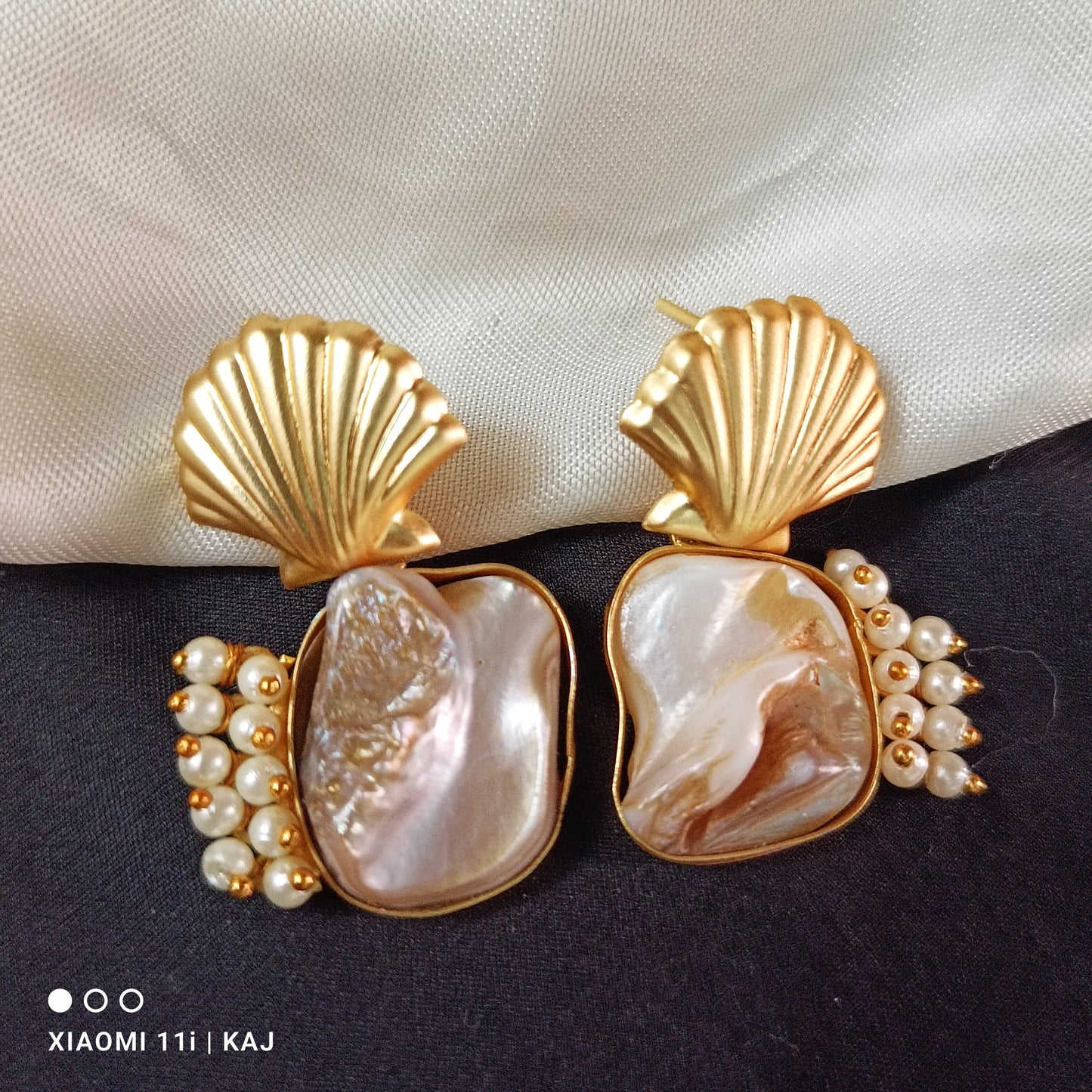 Mother of Pearl's earrings