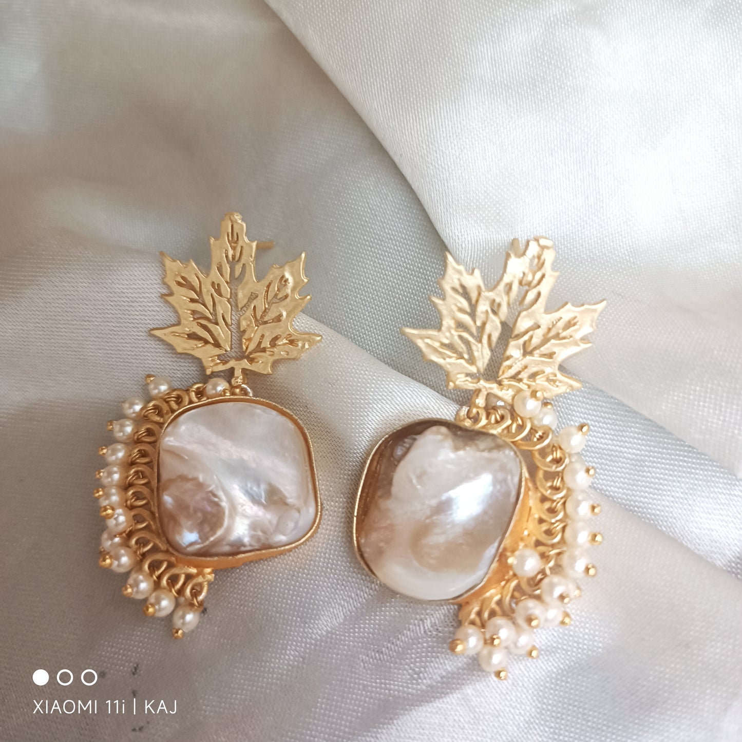 Mother of Pearl's earrings