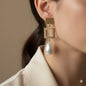 Sea shell Pearl's with brass top earrings