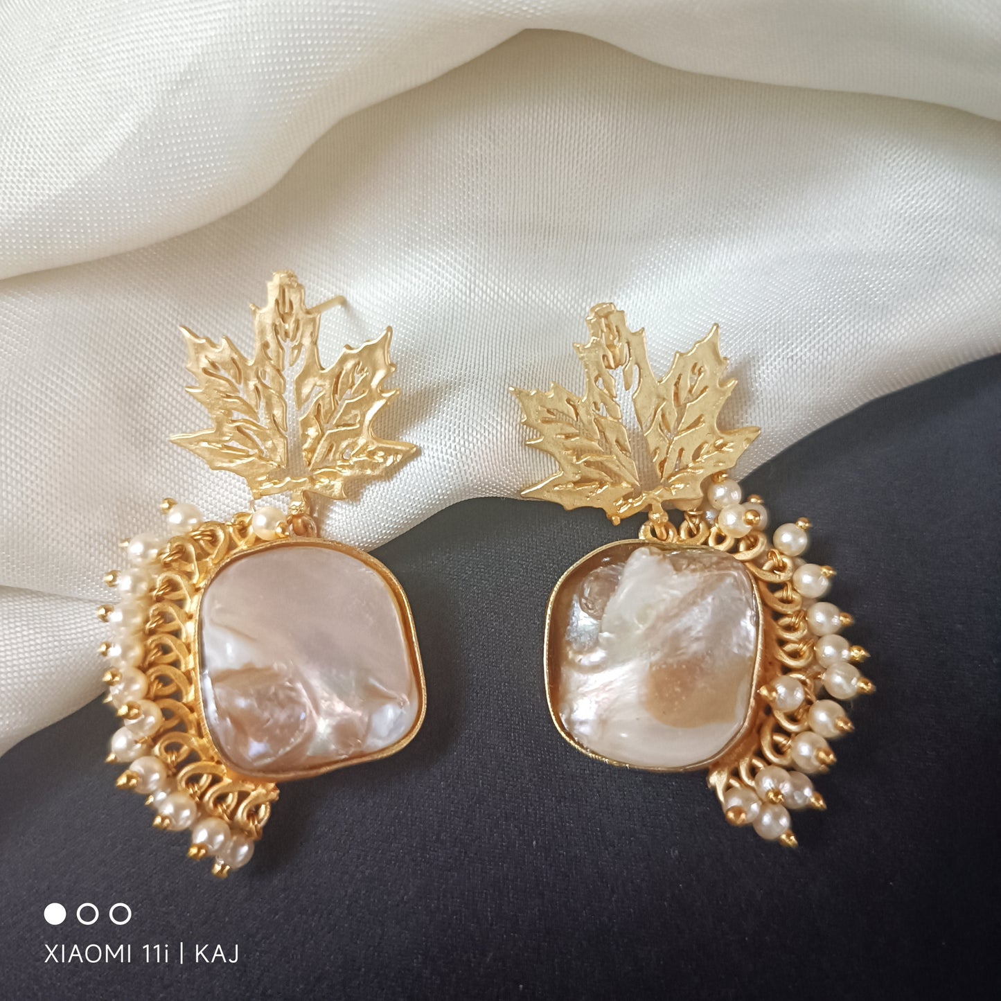 Mother of Pearl's earrings
